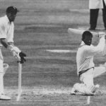 The defiant Kunderan goes down on one knee to drive Hobbs. Murray who equalled a world wicket keeping record is poised over the stumps.
