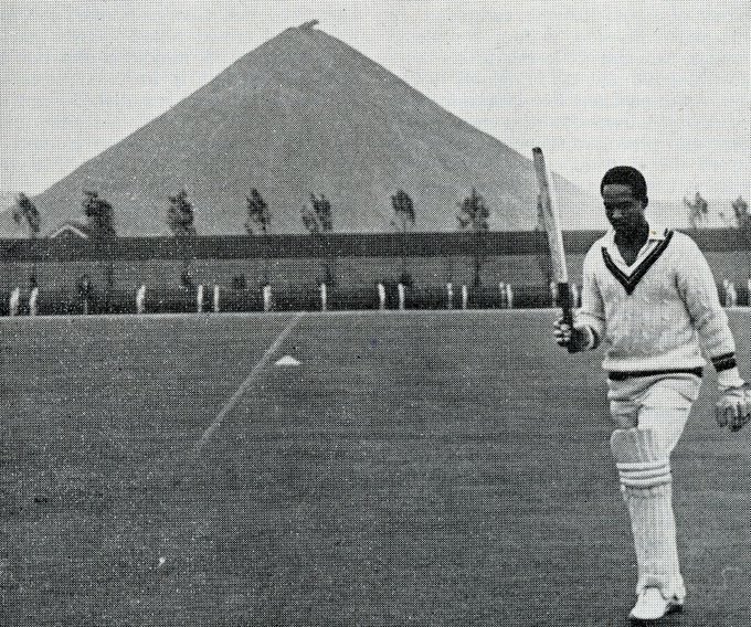 Sir Garry Sobers takes the plaudits after batting for Norton Stoke in the Staffordshire League in 1964. In all three seasons he was at the club they won the title. In the background is a massive spoil tip belonging to Norton (Ford Green) Colliery