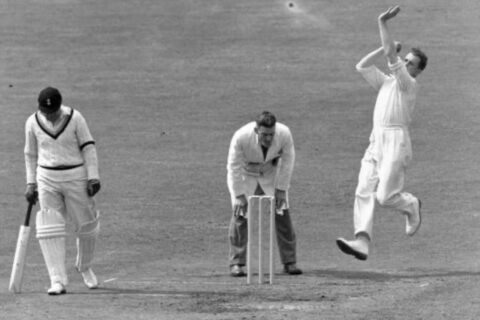 Jim Laker bowls for Surrey at the Oval, 1949.