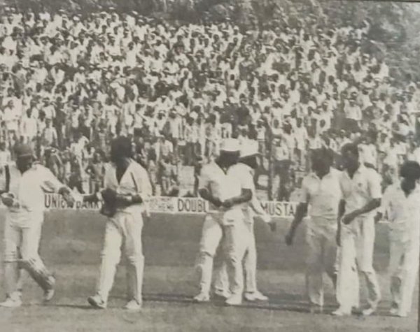 Raghuram Bhat (extreme left) congratulates Jeffery Dujon as the victorious West Indians return to the pavilion in the First Test at Kanpur in 1983-84